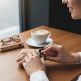 Bakers Bands Limited black stainless steel Milanese loop band for Apple Watch with folding buckle closure.